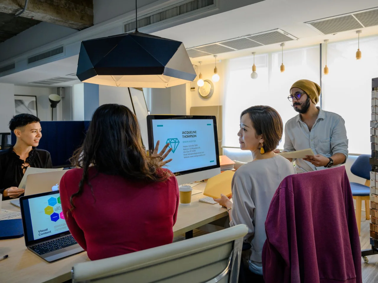 Four team members discussing about project